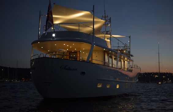 Classic Motor Yacht Sultana Anchored At Night