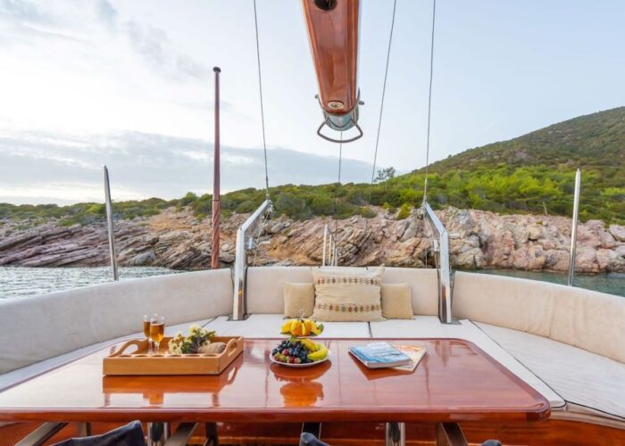 the 24m sailing gulet Kavira II aft deck and a full beam sofa, Sesula Bay, Croatia